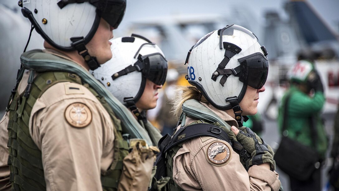 Sailors prepare to board an MH-60R Seahawk on the USS Carl Vinson in the Luzon Strait, Feb. 18, 2017. The aircraft carrier is deployed as part of the U.S. Pacific Fleet-led initiative to extend the command and control functions of U.S. 3rd Fleet. The sailors are assigned to Helicopter Maritime Strike Squadron 78. Navy photo by Petty Officer 2nd Class Sean M. Castellano