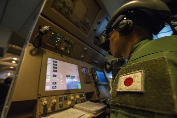Japan Air Self-Defense Force Tech. Sgt. Yoshiaki Otabe, 404th Squadron boom operator, controls the boom while performing aerial refueling of an F-15 Eagle during Cope North 17, Feb. 28, 2017. The exercise includes 22 total flying units and more than 2,700 personnel from three countries and continues the growth of strong, interoperable relationships within the Indo-Asia-Pacific region through integration of airborne and land-based command and control assets. (U.S. Air Force Photo by Senior Airman Keith James)