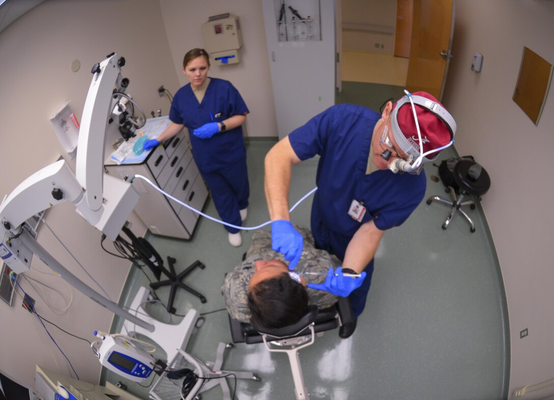 Lt. Col. Chester Barton, 374th Ear Nose and Throat Clinic otolaryngologist, administers Botox shots to Master Sgt. Danira Estrada, 374th Logistics Readiness Squadron section chief at Yokota Air Base, Japan, Feb. 16, 2017. Botox shots treat migraines by relaxing muscles that cause pain. Treating migraines is one of the many ways Yokota’s ENT clinic helps personnel keep doing their jobs happily and in good health. (U.S. Air Force photo by Senior Airman Elizabeth Baker)