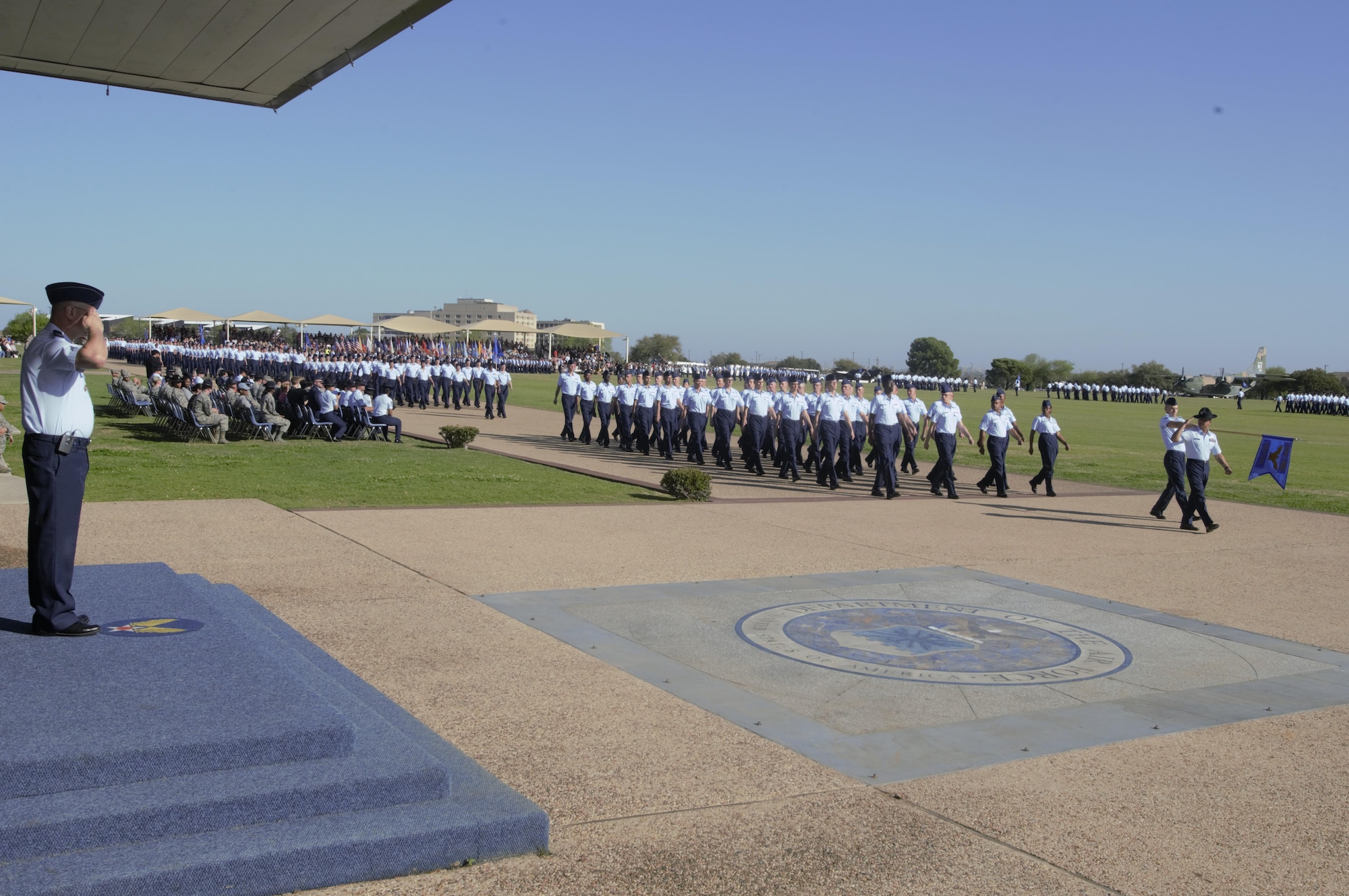 Col. Stephen Kravitsky, 90th Missile Wing commander, renders a salute as the Reviewing Official of the Basic Military Training Graduation Parade at Lackland Air Force Base, Texas, Feb. 24. The parade was the culminating event of a two-day tour of BMT during which noncommissioned officers from F.E. Warren AFB, Wyo., attended the Airman’s Run, Coining Ceremony and Graduation Parade as well as tours of the newest training facilities on the installation. (U.S. Air Force Photo by 1st Lt Esther Willett)