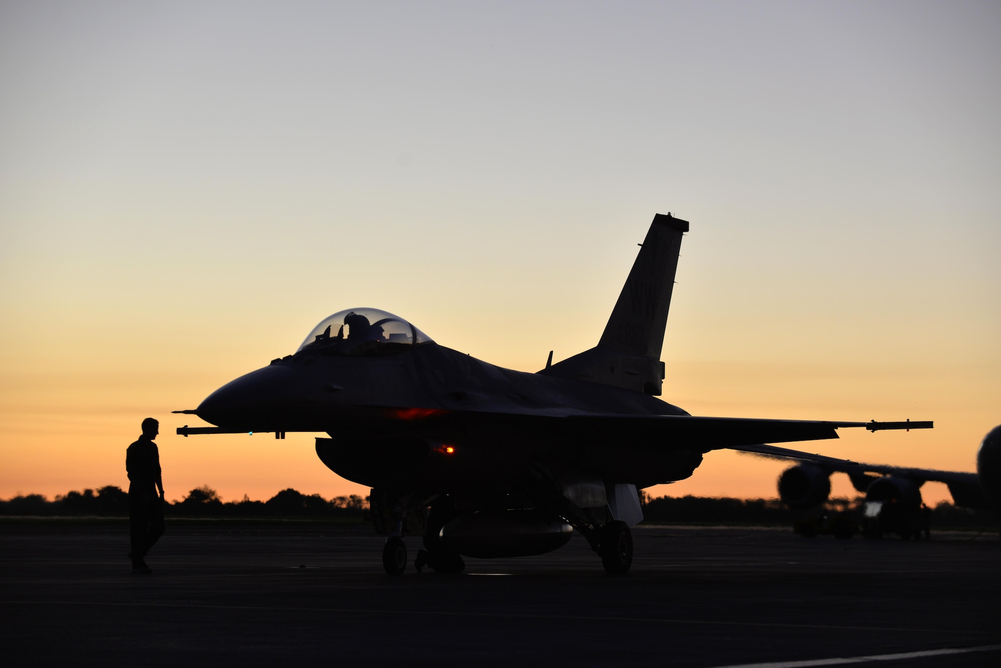 A Wild Weasel F-16 Fighting Falcon sits on the tarmac shortly after arriving at Royal New Zealand Air Force Base Ohakea, New Zealand, Feb. 24, 2017. The Pacific Air Forces demonstration team showcases a positive, professional image of the United States Air Force to the people of the Western Pacific, making personal contact with host nation people on and off the flightline while showing support for the host government through the United States' presence. (U.S. Air Force photo by Senior Airman Jarrod Vickers)