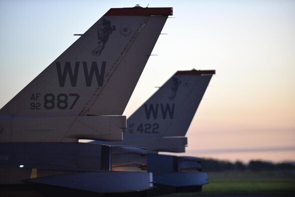 Wild Weasel F-16 Fighting Falcons sit side-by-side at Royal New Zealand Air Force Base Ohakea, New Zealand, Feb. 24, 2017. Maj. Richard Smeeding, F-16 demo pilot with the Pacific Air Forces Demonstration Team, and Capt. Mike Dreher, F-16 demo safety observer with the team, were the first to arrive, ahead of more than 20 additional crew members traveling with them. (U.S. Air Force photo by Senior Airman Jarrod Vickers)