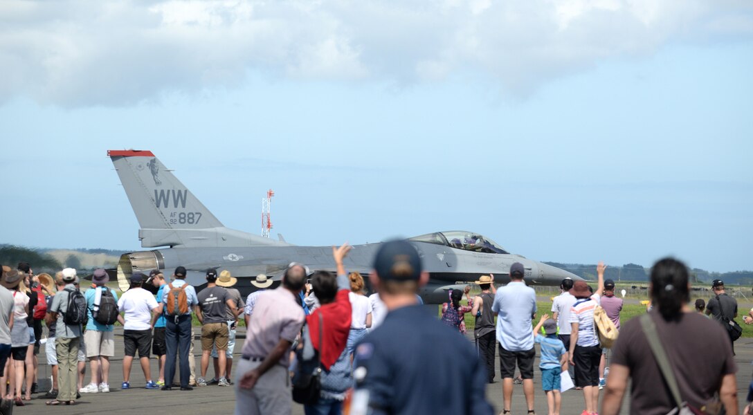 Onlookers welcome Maj. Richard Smeeding after his aerial demonstration at Royal New Zealand Air Force Base Ohakea, New Zealand, Feb. 26, 2017. The Air Tattoo is held once every five years. The 2017 show celebrates 80 years of the RNZAF. Partner nations practice interoperability by bringing together 13 international aircraft from eight different countries. (U.S. Air Force photo by Senior Airman Jarrod Vickers)