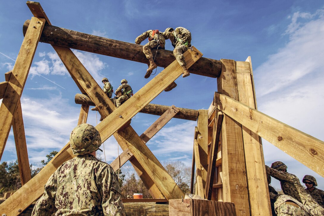 Sailors build a watch post during a field training exercise at Camp Shelby, Miss., Feb. 20, 2017. The sailors are assigned to Naval Mobile Construction Battalion 133. Navy photo by Petty Officer 2nd Class Ignacio D. Perez