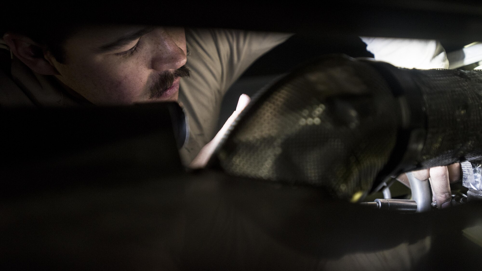 Senior Airman Jacob Porter, 455th Expeditionary Aircraft Maintenance Squadron aerospace propulsion technician, performs engine maintenance on a C-130J Hercules Dec. 5, 2016 at Bagram Airfield, Afghanistan. The C-130J incorporates state-of-the-art technology, which reduces manpower requirements, lowers operating and support costs, and provides life-cycle cost savings over earlier C-130 models. (U.S. Air Force photo by Staff Sgt. Katherine Spessa)