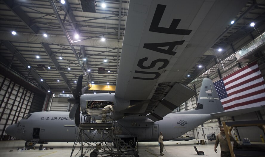 Members of the 455th Expeditionary Aircraft Maintenance Squadron perform an inspection on a C-130J Hercules Dec. 5, 2016 at Bagram Airfield, Afghanistan. The C-130 Hercules primarily performs a tactical airlift mission. The aircraft is capable of operating from rough, dirt strips and is the prime transport for airdropping troops and equipment into hostile areas. (U.S. Air Force photo by Staff Sgt. Katherine Spessa)