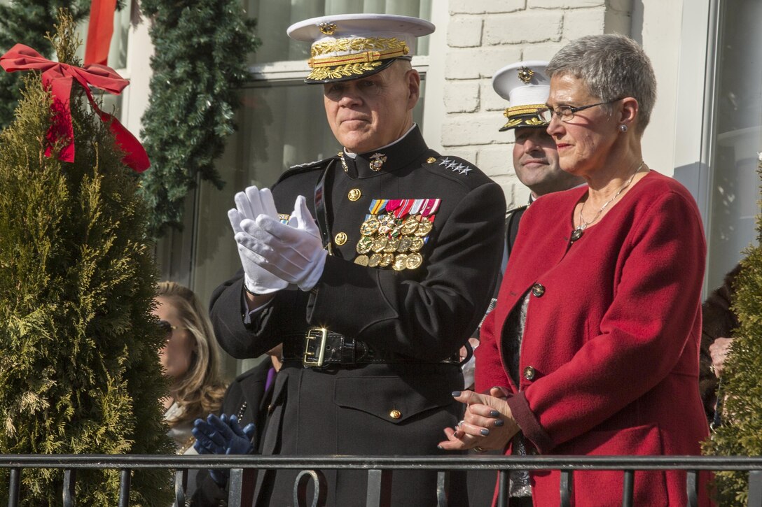 Commandant of the Marine Corps Gen. Robert B. Neller applauds during the 2017 Surprise Serenade at the Home of the Commandants, Washington, D.C., Jan. 1, 2017. The Surprise Serenade is a tradition that dates back to the mid-1800’s in which the U.S. Marine Band performs music for the Commandant of the Marine Corps at his home on New Years Day. 