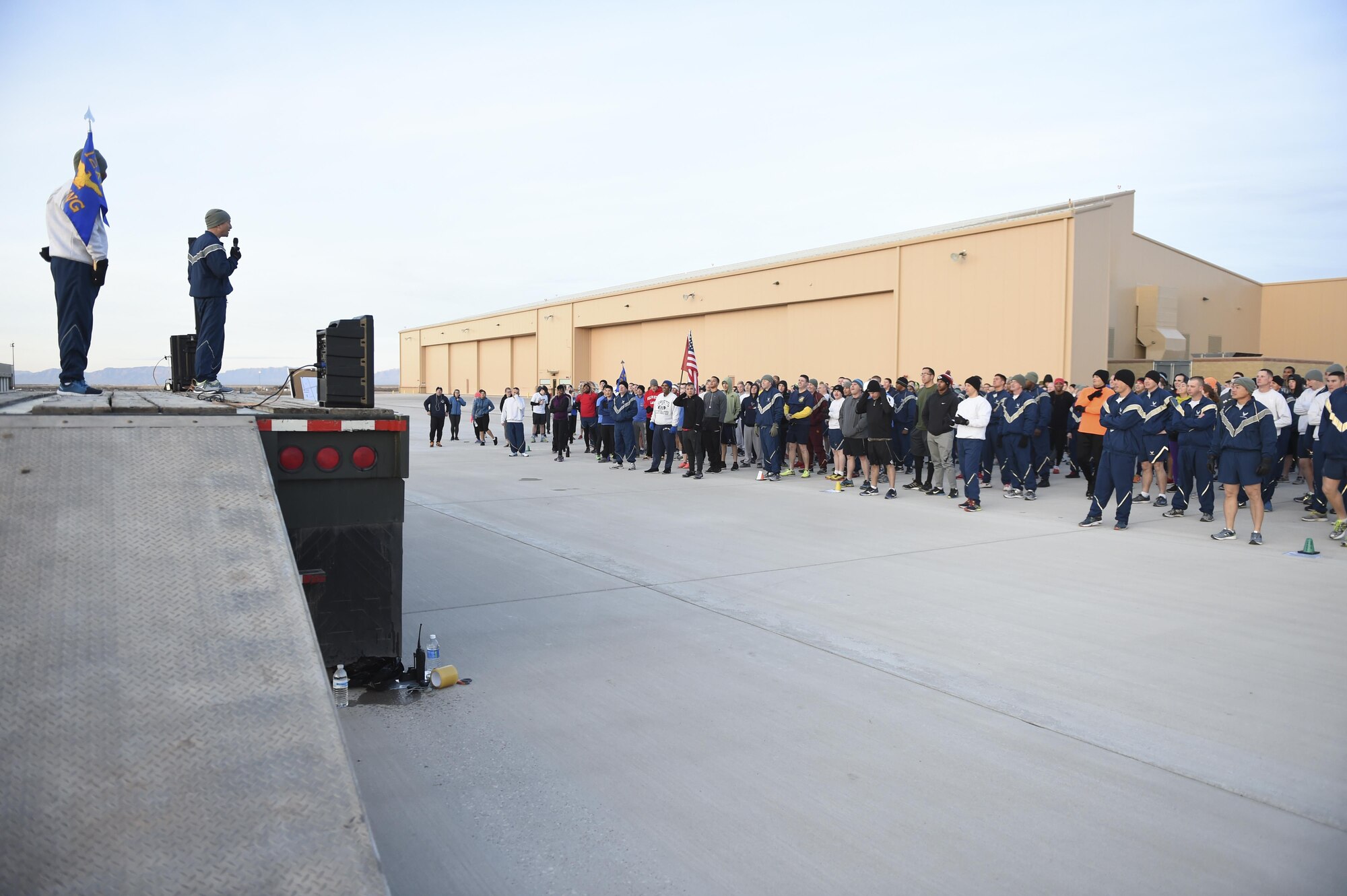Col. Houston Cantwell, the 49th Wing commander, provides opening remarks during the Proud to be a 49'er Fun Run Jan. 3, 2017 at Holloman Air Force Base to ring in the New Year. The run was held on the flight line with an option to run 1.5 mile or 5K. Participants were encouraged to show their pride by wearing anything that demonstrated their Air Force pride, such as a favorite team jersey or a fun costume. (U.S. Air Force photo by Staff Sgt. Stacy Jonsgaard)