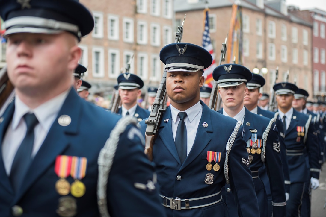 Airman 1st Class Davian Harris, U.S. Air Force Honor Guard ceremonial guardsman, marches in formation Allstate Sugar Bowl New Years Eve Parade in New Orleans, LA, Dec. 31, 2016. More than 90 members of the USAF HG performed in the event, which was held in celebration of the Allstate Sugar Bowl, where the Auburn Tigers and Oklahoma Sooners will battle for the cup, Jan 2., 2017.