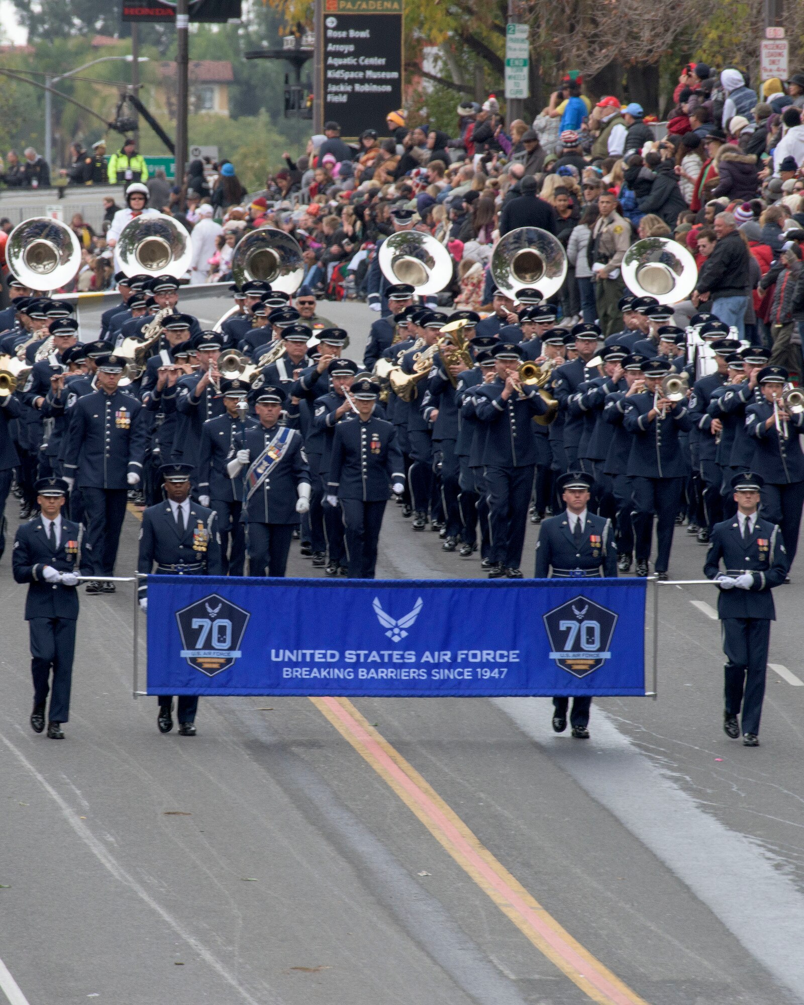 The United States Air Force Total Force Band performs in the 128th Rose Parade in Pasadena, Calif., Jan. 2, 2017. The USAF Total Force Band kicked off the Air Force 70th Birthday celebration playing several venues in Southern California culminating with their appearance in the Rose Parade. The band is comprised of active-duty and Air National Guard musicians from around the Air Force. (U.S. Air Force photo/Louis Briscese)