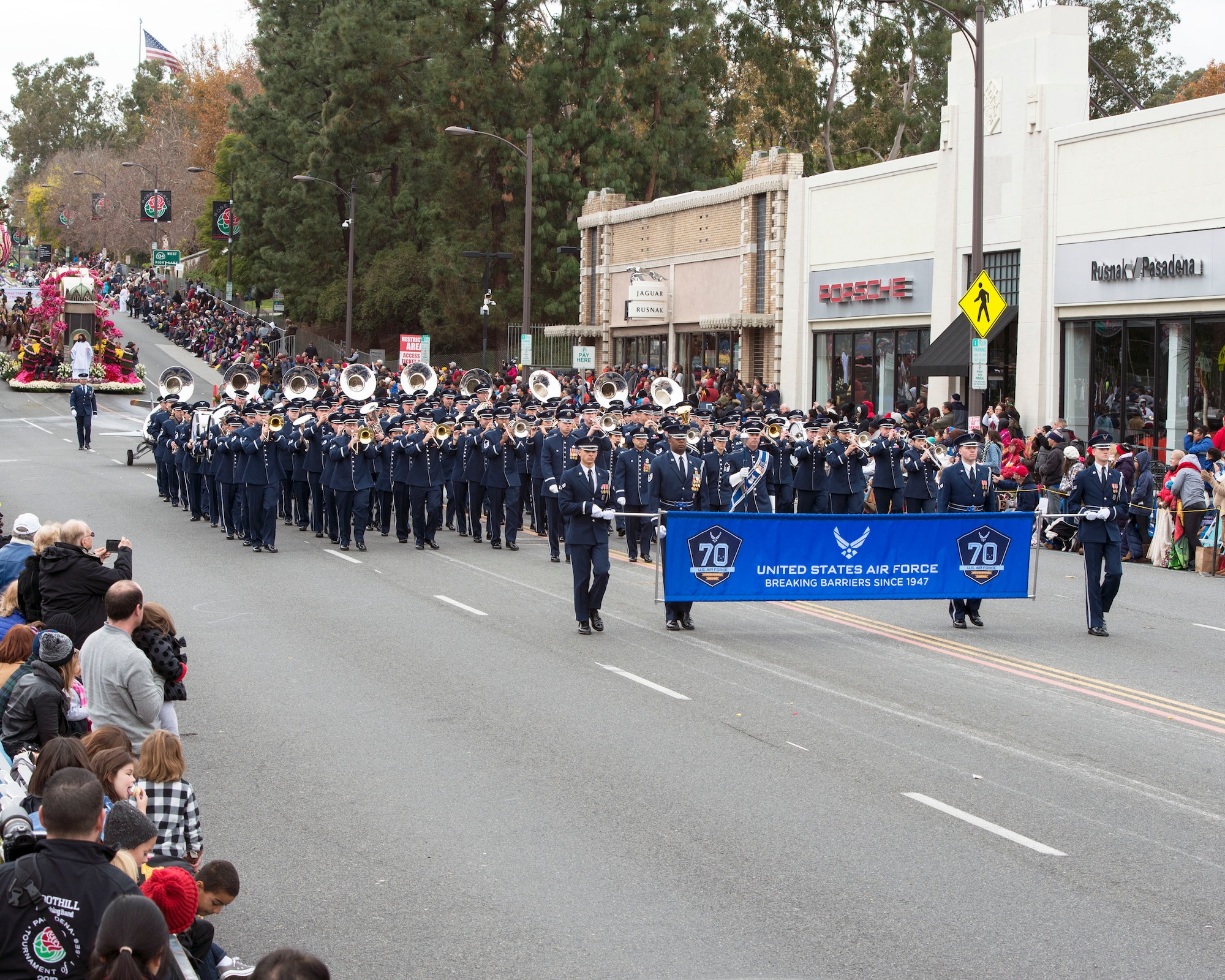 The United States Air Force Total Force Band performs in the 128th Rose Parade in Pasadena, Calif., Jan. 2, 2017. The USAF Total Force Band kicked off the Air Force 70th Birthday celebration playing several venues in Southern California culminating with their appearance in the Rose Parade. The band is comprised of active-duty and Air National Guard musicians from around the Air Force. (U.S. Air Force photo/Louis Briscese)