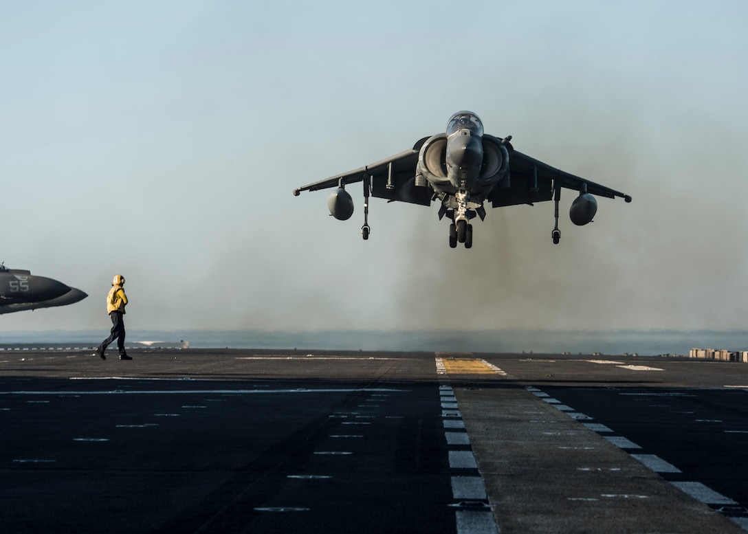 170101-N-LI768-132 GULF OF ADEN (Jan. 1, 2017) An AV-8B Harrier assigned to the Ridge Runners of Marine Medium Tiltrotor Squadron (VMM) 163 (Reinforced), lands aboard the amphibious assault ship USS Makin Island (LHD 8). Makin Island is deployed as part of the Makin Island Amphibious Ready group to the U.S. 5th Fleet area of operations in support of maritime security operations and theater security cooperation efforts. (U.S. Navy photo by Mass Communication Specialist 3rd Class Devin M. Langer/Released)