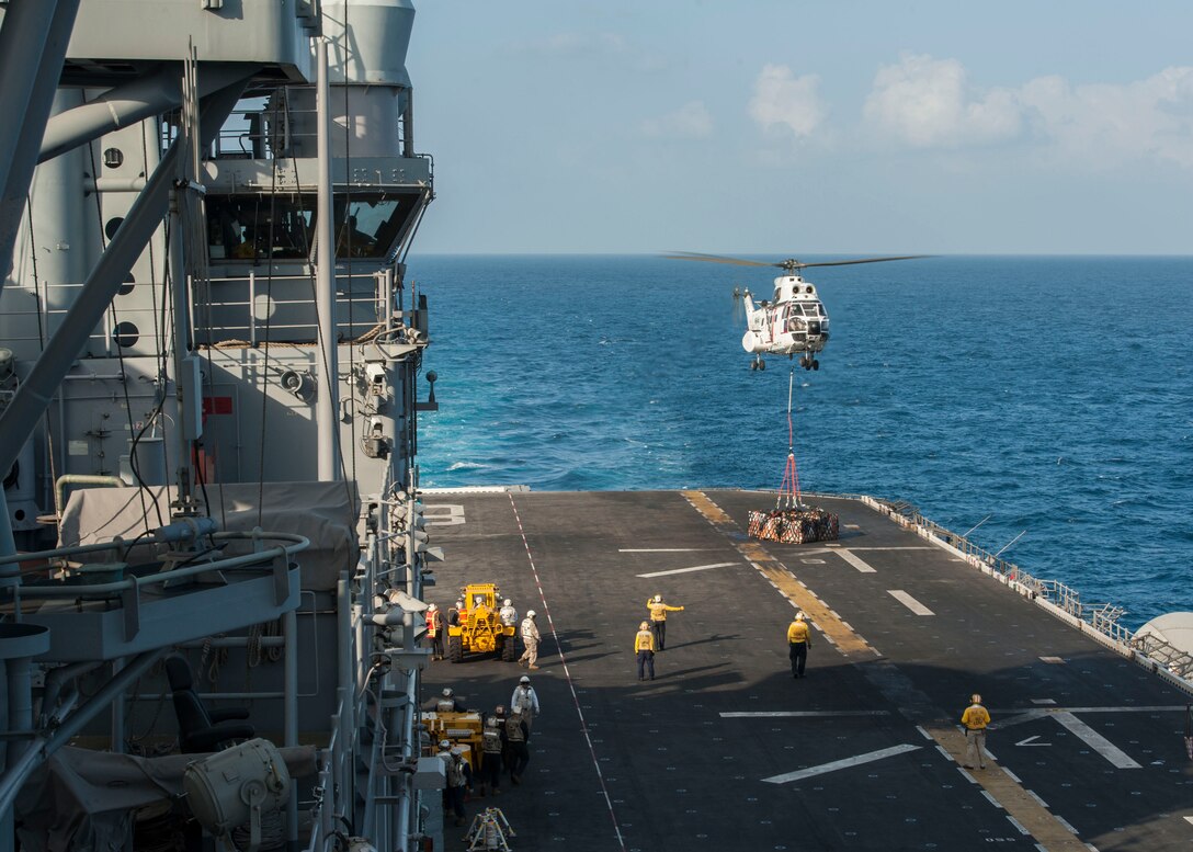 161223-N-EW322-083
GULF OF ADEN (Dec. 23, 2016) An SA-330 Puma helicopter assigned to fleet replenishment oiler USNS Walter S. Diehl (T-AO 193), delivers pallets to the flight deck of the amphibious assault ship USS Makin Island (LHD 8) during a replenishment-at-sea. Makin Island is deployed as part of the Makin Island ARG to the U.S. 5th Fleet area of operations to support maritime security operations and theater security cooperation efforts. (U.S. Navy photo by Mass Communication Specialist 3rd Class Clark Lane)