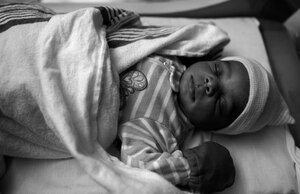 Samaria Tomlin, daughter of U.S. Navy Seaman Keaton Tomlin, assigned to Naval Station Norfolk, Va., sleeps at the U.S. Air Force Hospital Langley, at Joint Base Langley-Eustis, Va., Jan. 3, 2017. Samaria, the first baby born in the New Year at JBLE , arrived at 7:02 p.m., weighing 7 pounds 4 ounces and measuring 20 inches in length. (U.S. Air Force photo by Airman 1st Class Kaylee Dubois)