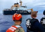 In this file photo, a joint boarding team from the U.S. Coast Guard buoy tender USCGC Sequoia (WLB-215) awaits permission to proceed to a fishing vessel to conduct boarding in the Palau exclusive economic zone Sept. 5, 2016. The boardings were conducted under a U.S. Coast Guard and bilateral agreement with Palau, additional support came from the Marine Forces Pacific 3rd Radio Battalion and the Australian Fisheries Management Authority.