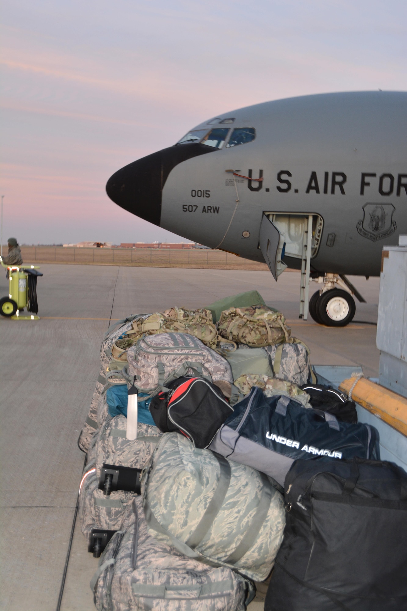 Bags from some of the 94 Reservists from the 507th Air Refueling Wing sit on the flight line prior to being loaded on the KC-135R Stratotanker behind them.  Members of the wing deployed to Incirlik Air Base, Turkey to support air refueling operations in Southwest Asia December 12-13, 2016. (U.S. Air Force Photo/Maj. Jon Quinlan)