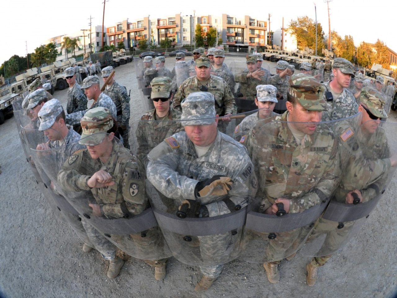Members of the 270th and 649th Military Police Companies, 49th Military Police Brigade, California Army National Guard, move into formation to respond to a civil disturbance in Los Angeles, Nov. 17, 2016, during Exercise Vigilant Guard 17 at the Federal Emergency Management Agency Headquarters, California Task Force I, Los Angeles. Army National Guard photo by Staff Sgt. Eddie Siguenza