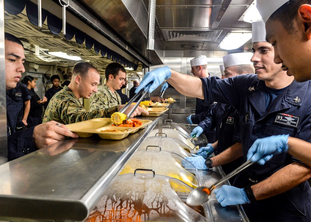 161126-N-LR795-207
Fresh corn, carrots and potatoes are among the items DLA Troop Support provides to military customers throughout the year and especially during holidays like Thanksgiving and Christmas.
========================================================






PACIFIC OCEAN (Nov. 26, 2016) Members of the First Class Petty Officer Association serve Thanksgiving dinner on the mess decks aboard the amphibious transport dock ship USS Somerset (LPD 25). Somerset, part of the Makin Island Amphibious Ready Group, celebrated Thanksgiving while operating in the U.S. 7th Fleet area of operations with the embarked 11th Marine Expeditionary Unit in support of security and stability in the Indo-Asia-Pacific region. (U.S. Navy photo by Petty Officer 3rd Class Amanda Chavez/Released)