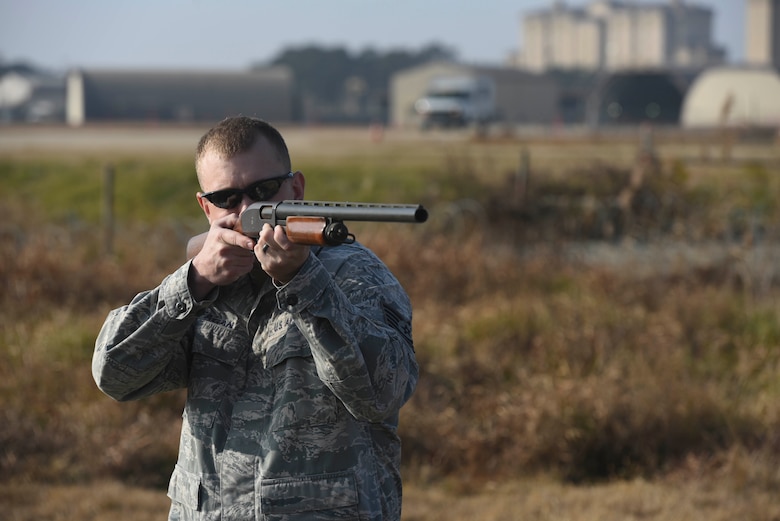 Tech. Sgt. Blake Fagan, 8th Operations Support Squadron aircraft management training noncommissioned officer in charge, looks down the sights of his shotgun at Kunsan Air Base, Republic of Korea, Jan. 3, 2017. Fagan takes part in the Bird/wildlife Aircraft Striking Hazard program as part of his primary duties. The BASH program is designed to deter wildlife that could cause significant damage to aircraft. (U.S. Air Force photo by Senior Airman Michael Hunsaker)