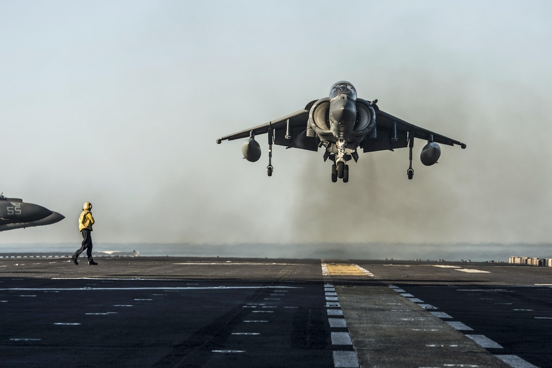 An AV-8B Harrier  lands aboard the USS Makin Island in the Gulf of Aden, Jan. 1, 2017. The Harrier is assigned to Marine Medium Tiltrotor Squadron. The amphibious assault ship is supporting maritime security operations and theater security cooperation efforts in the U.S. 5th Fleet area of operations. Navy photo by Petty Officer 3rd Class Devin M. Langer