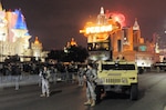 Nevada National Guard Soldiers patrol the Las Vegas Strip Dec. 31, 2016, as part of Operation Night Watch, an annual law enforcement mission supporting the Las Vegas Metropolitan Police Department during the annual New Year's Eve celebration.