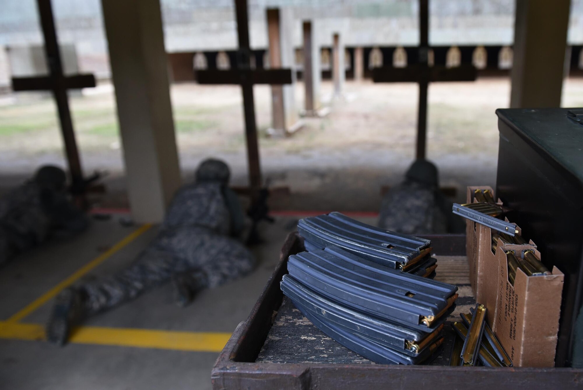 Airmen from the 19th Airlift Wing fire M4 assault rifles during a Combat Arms Training and Maintenance session Dec. 14, 2016, at Little Rock Air Force Base, Ark. The 19th Security Forces Squadron CATM flight taught weapons safety and accountability to more than 650 people last year at Little Rock AFB.  (U.S. Air Force photo by Airman 1st Class Kevin Sommer Giron)