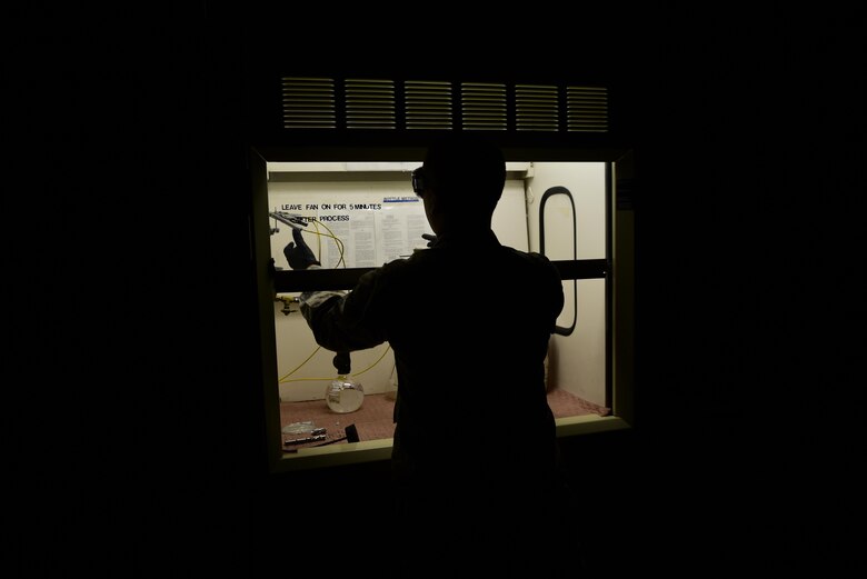 Senior Airman Hector Nazario, a fuels laboratory technician assigned to the 28th Logistics Readiness Squadron, performs a test in the fuels lab at Ellsworth Air Force Base, S.D., Dec. 14, 2016. The fuels lab Airmen ensure the fuel going into the aircraft and vehicles is of the highest quality and meet all standards. (U.S. Air Force photo by Airman 1st Class James L. Miller)
