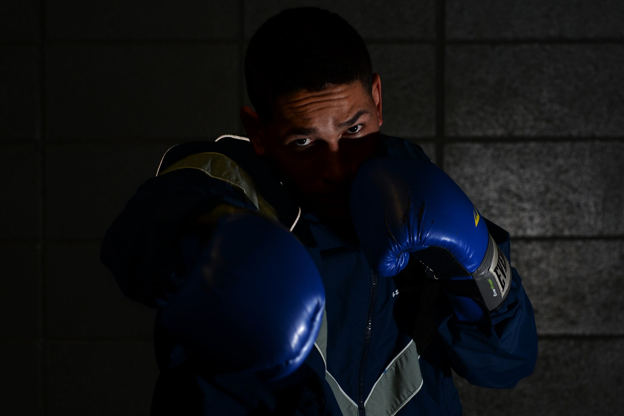 First Lt. Christian Torres, 81st Comptroller Squadron deputy project officer, throws a right jab at the Triangle Gym, March 3, 2016, Keesler Air Force Base, Miss. Torres boxed recreationally and had the opportunity to become a professional boxer, however, due to family needs he chose his current path in the U.S. Air Force. (U.S. Air Force Photo by Airman 1st Class Travis Beihl)