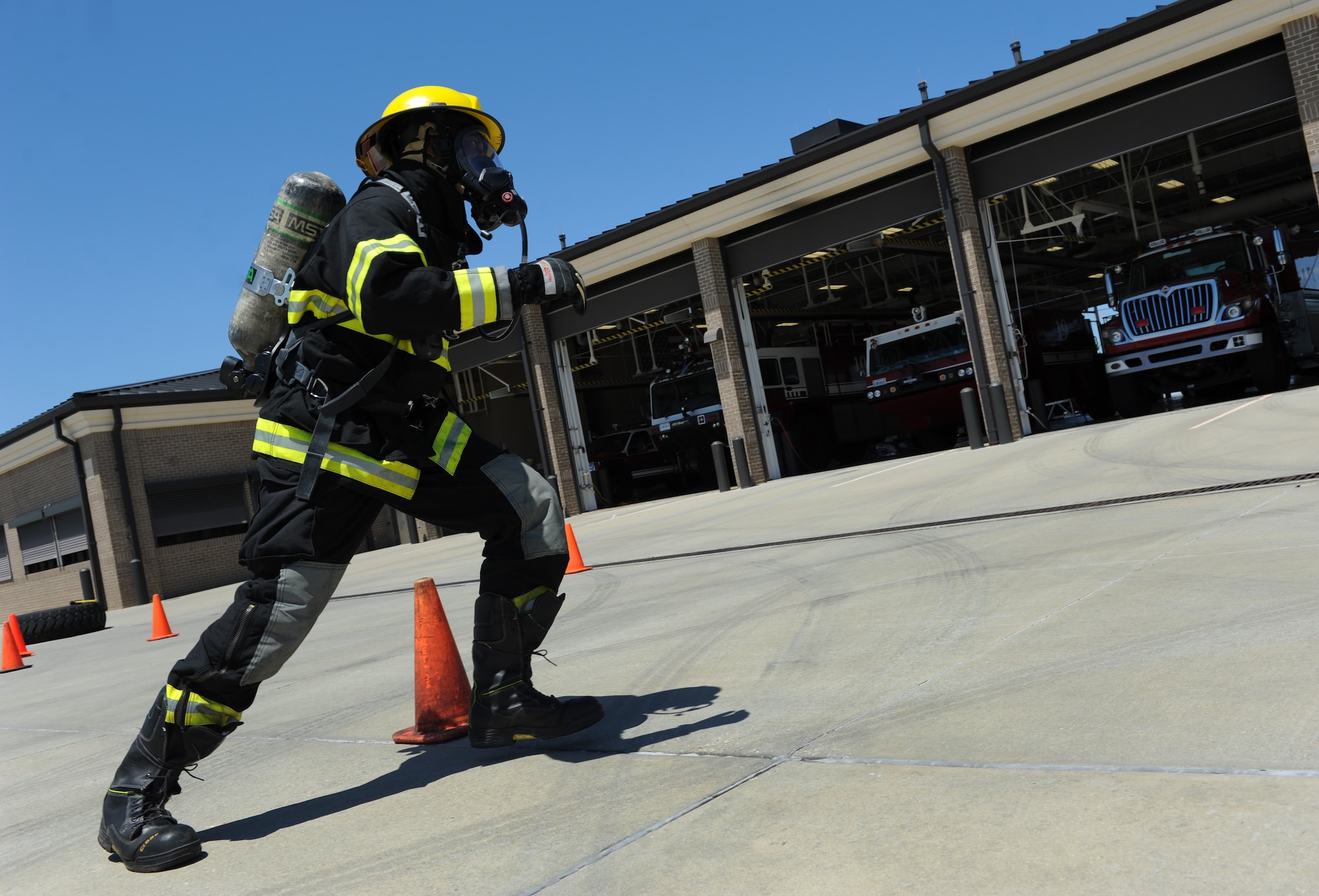 Tech. Sgt. Lawrence Ricks, 81st Infrastructure Division firefighter, runs through the serpentine course at the Keesler Fire Department as he trains for the 2016 Firefighter Combat Challenge Competition Wild Card Week, May 4, 2016, Keesler Air Force Base, Miss. Four members from the fire department competed in the qualifying round at Lake Charles, La., Apr. 30. (U.S. Air Force photo by Kemberly Groue)