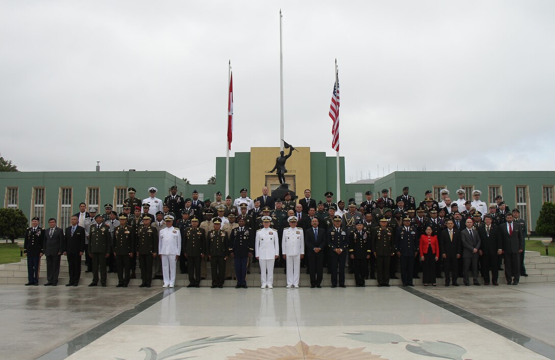 U.S. Navy Adm. Kurt Tidd, commander of U.S. Southern Command, center, joins senior military leaders and government representatives from 20 nations attending the opening ceremony for the Fuerzas Comando 2016 Senior Leader Seminar May 9 at the Chorrillos Military School in Lima, Peru. The three-day seminar includes briefings and discussions on counterterrorism decisions and policymaking, organized crime and illicit trafficking. (Photo by Jose Ruiz)