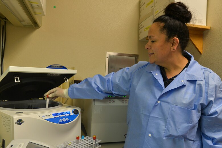 Raquel Hoskins, 5th Medical Support Squadron medical laboratory technician, places a blood sample in a centrifuge at Minot Air Force Base, N.D., Dec. 13, 2016. The centrifuge separates red blood cells from plasma and serum for use in chemical analysis testing. (U.S. Air Force photo/Airman 1st Class Jessica Weissman)