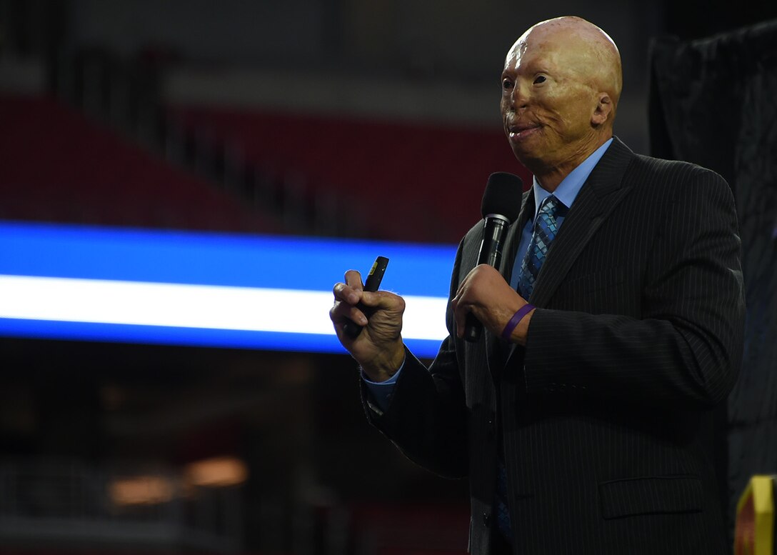Mr. Jason Schechterle, retired Phoenix police officer, speaks with Airmen during Luke’s Wingman Day Jan. 3, 2017 at University of Phoenix Stadium in Glendale, Ariz. Luke AFB Wingman Day offered a pause in the day-to-day mission to demonstrate how working as a team creates momentum, improves morale, nourishes our selfless culture, and fosters trust through an amazing sense of accomplishment. (U.S. Air Force photo by Senior Airman Devante Williams)