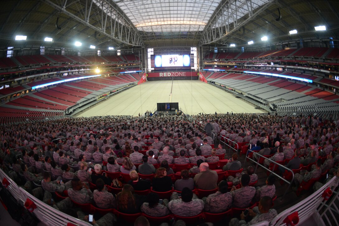 56th Fighter Wing Airmen gather together before kicking off Wingman Day Jan. 3, 2016 at the University of Phoenix Stadium in Glendale, Ariz. The Wingman Day is a pause in our day-to-day mission to demonstrate how working as a team creates momentum, improves morale, nourishes our selfless culture, and fosters trust through an amazing sense of accomplishment. (U.S. Air Force photo by Airman 1st Class Alexander Cook)