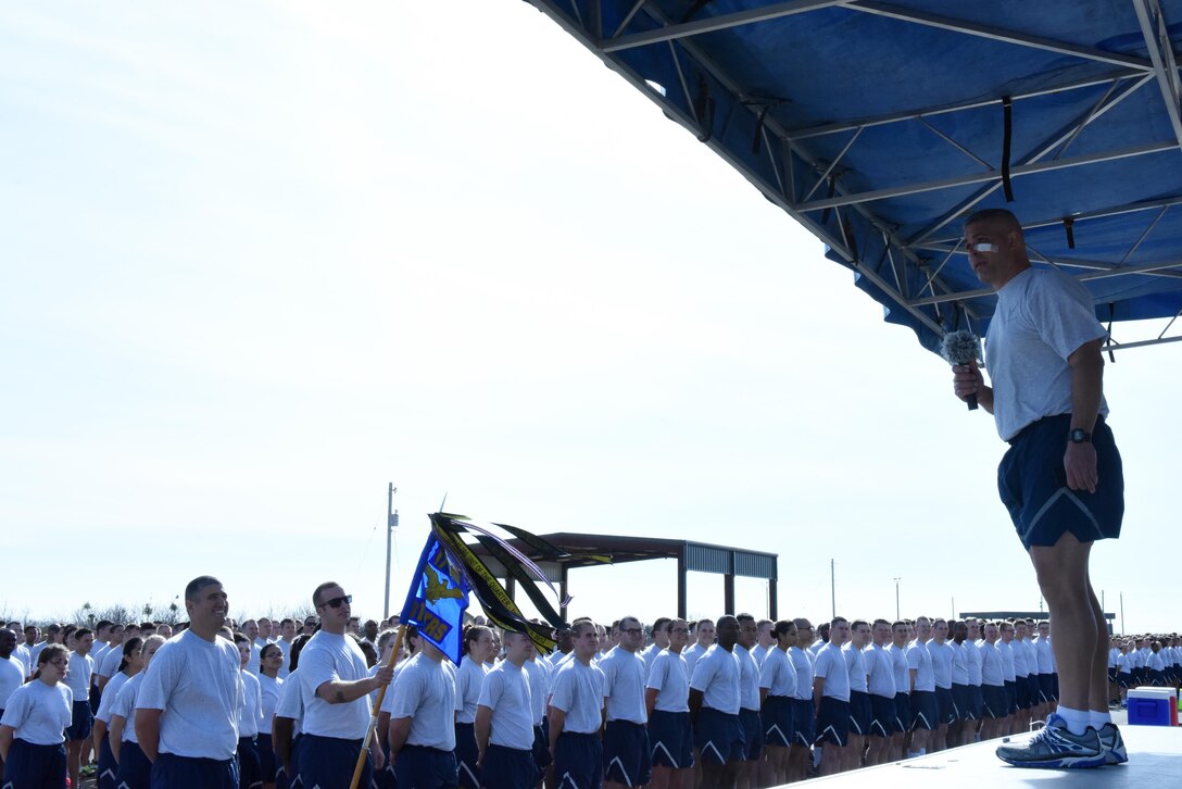 U.S. Air Force Col. Alex Ganster, 17th Training Group Commander, preps the 17th TRG and 17th Training Support Squadron before a formation run on the flightline at Goodfellow Air Force Base, Texas, Jan. 3, 2017. Around 2,000 Goodfellow members participated in the run. (U.S. Air Force photo by Airman 1st Class Caelynn Ferguson/ Released)