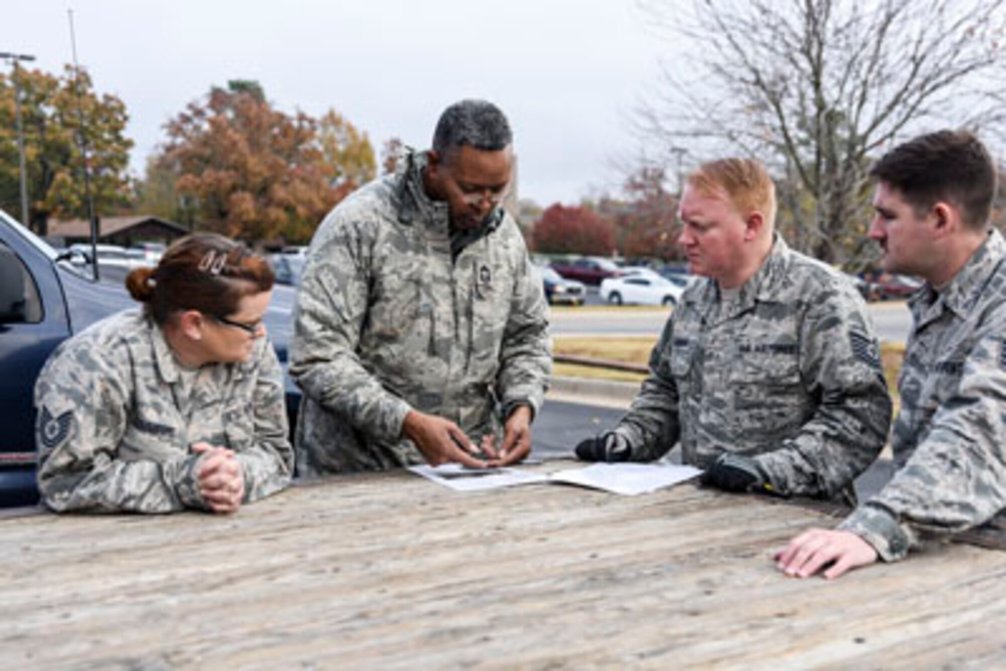 Chief Master Sgt. Kenneth Fisher, the 189th Logistics Readiness Squadron vehicle maintenance manager runs through plans with members of the Rapid Augmentation Team during a R.A.T. load drill Nov. 29, 2016, at Little Rock Air Force Base, Ark. Coordination and proper planning are key elements to the success of the R.A.T. convoy during state emergencies. (U.S. Air National Guard photo by Tech. Sgt. Jessica Condit)