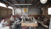 Members of the 455th Expeditionary Aircraft Maintenance Squadron celebrate the completion of their new hang-out spot on Thanksgiving, Nov. 24, 2016 at Bagram Airfield, Afghanistan. Units around Bagram do their best to make the deployed location feel like home by decorating, building places to relax and playing games. (U.S. Air Force photo by Staff Sgt. Katherine Spessa)