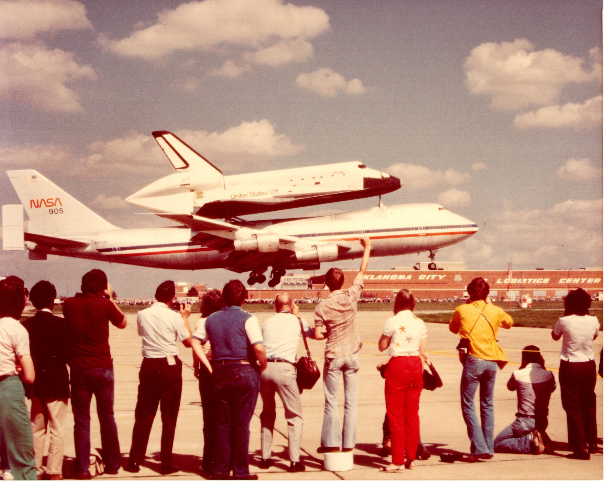 The space shuttle “Columbia” lands at Tinker AFB April 27, 1981, for an overnight stopover following its first orbital mission and touchdown in the California desert. More than 200,000 sightseers greet the shuttle, which rides securely on the back of a Boeing 747.