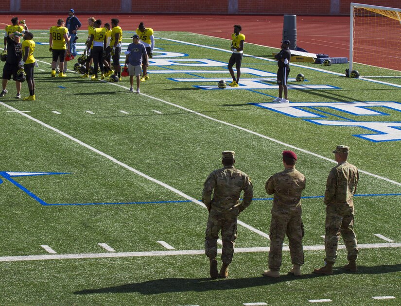 U.S. Army All-American Bowl Soldier mentors observe the joint East/West practice from the sidelines Jan. 3, at Heroes Stadium in San Antonio. Soldier mentors are selected because they have excelled in their personal and professional endeavors, are paired with AAB participants to share their personal stories of perseverance, selfless-service and excellence with the All-Americans. The practice was held in preparation for the 2017 U.S. Army All-American Bowl, which will kick off Jan. 7, at the San Antonio Alamodome, and will be broadcast live on NBC at 12 p.m. CST. The U.S. Army All-American Bowl is the nation's premier high school football game and it provides a platform for Soldiers to engage with students, families and community officials while showcasing the Army’s latest innovations in technology and its ongoing commitment to the development of America’s future leaders. (U.S. Army Reserve photo by Spc. James Lefty Larimer, 367th Mobile Public Affairs Detachment)