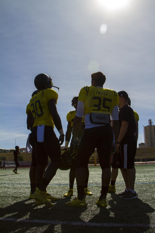 U.S. Army All-American Bowl athletes huddle during the joint East/West practice Jan. 3, at Heroes Stadium in San Antonio. The practice was held in preparation for the 2017 U.S. Army All-American Bowl, which will kick off Jan. 7, at the San Antonio Alamodome, and will be broadcast live on NBC at 12 p.m. CST. The U.S. Army All-American Bowl is the nation's premier high school football game and it provides a platform for Soldiers to engage with students, families and community officials while showcasing the Army’s latest innovations in technology and its ongoing commitment to the development of America’s future leaders. (U.S. Army Reserve photo by Spc. James Lefty Larimer, 367th Mobile Public Affairs Detachment)