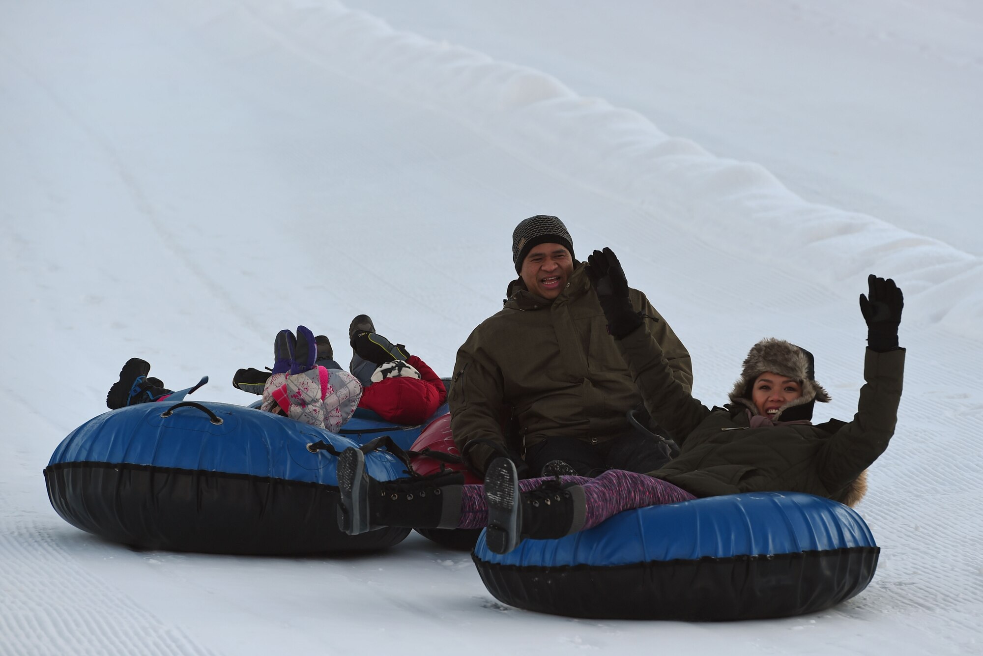 Joint Base Elmendorf-Richardson service members and families participate in Winterfest at the Hillberg Ski Area, Dec. 22, 2016.The event featured face painting, gingerbread house making, pictures with Santa, snow machine riding, dog sled riding, tubing, skiing and snowboarding. 