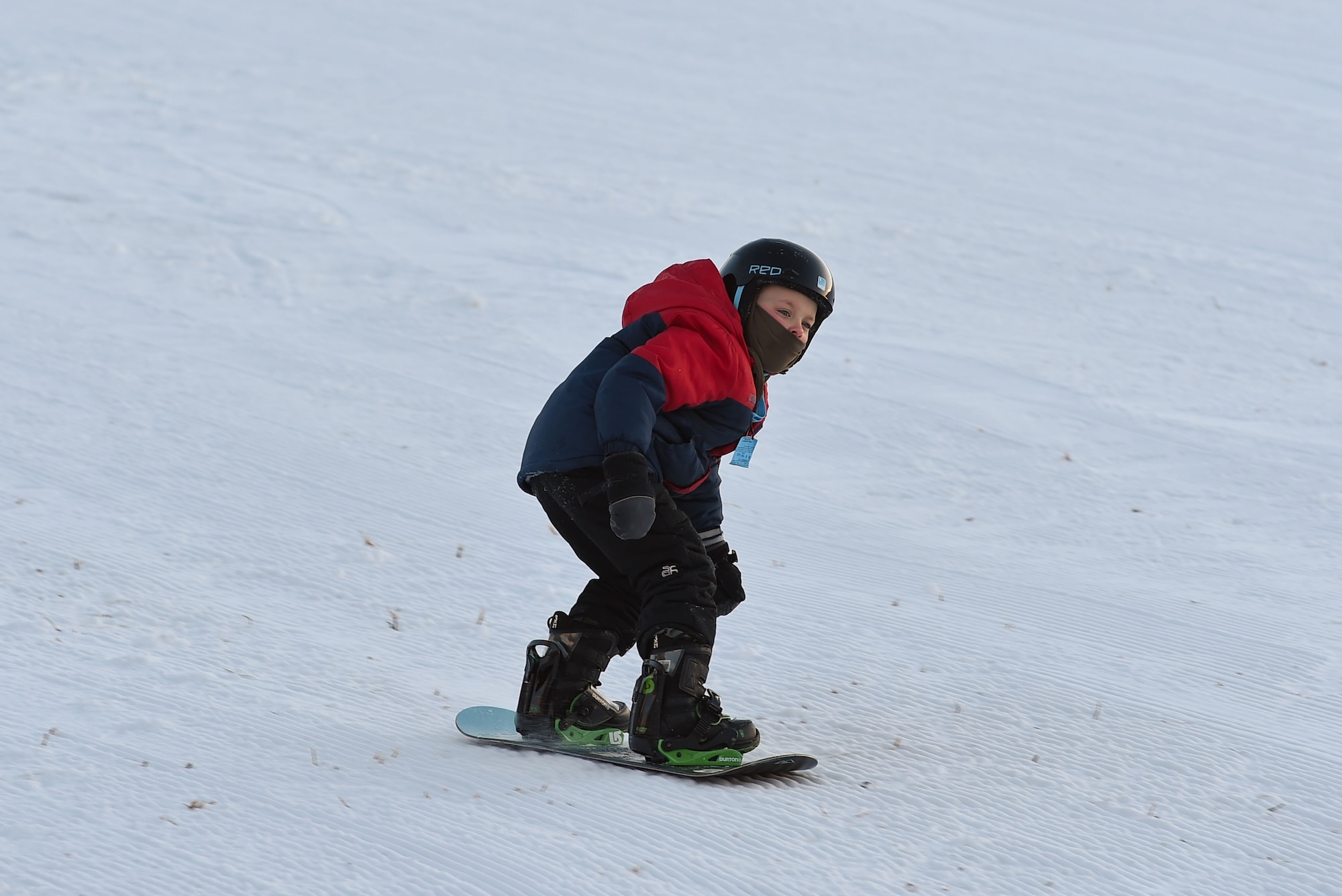 Joint Base Elmendorf-Richardson service members and families participate in Winterfest at the Hillberg Ski Area, Dec. 22, 2016.The event featured face painting, gingerbread house making, pictures with Santa, snow machine riding, dog sled riding, tubing, skiing and snowboarding. 