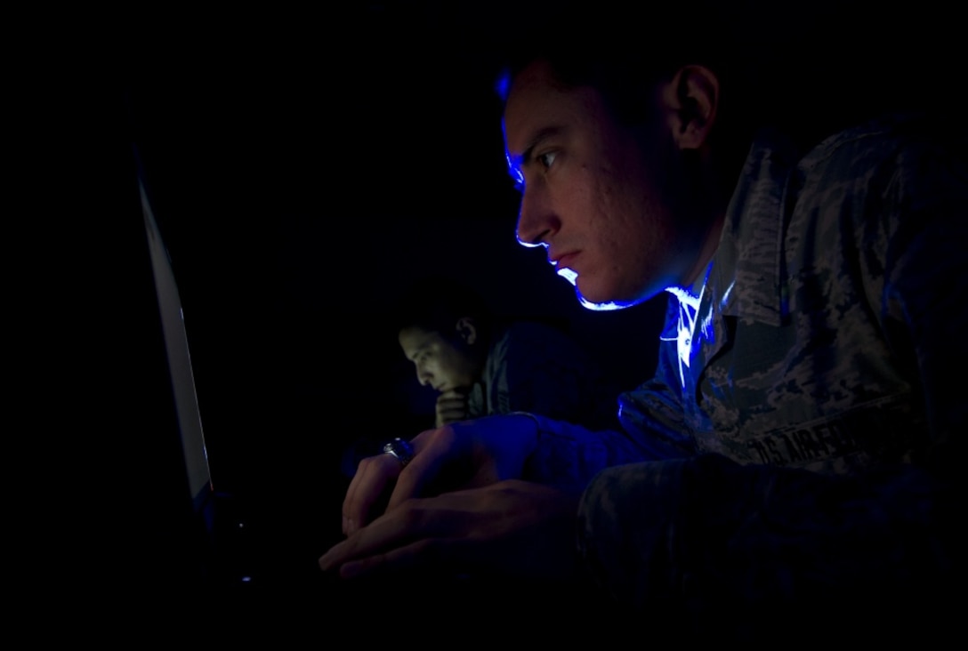 A photo illustration of members of the Cyber Squadron Initiative program. The Cyber Squadron Initiative is a pathfinder for innovation within the Air Force cyber domain that combines airmen from different specialty codes to enhance cyber security on Air Force installations. The 325th Communication Squadron is one of 16 squadrons designated for the Cyber Squadron Initiative across the Air Force, and the first selected for Air Combat Command. Air Force photo illustration by Senior Airman Solomon Cook