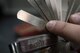 U.S. Air Force Staff Sgt. Jeffery Tyler, a 35th Maintenance Group physical dimension NCO in charge, displays a measurement on a shim at Misawa Air Base, Japan, Nov. 2, 2016. Shims are used by the precision measurement equipment laboratory verifying the thickness between two objects are in the range they need to be. The tool can be as thin as .0015 of an inch. (U.S. Air Force photo by Airman 1st Class Sadie Colbert)
