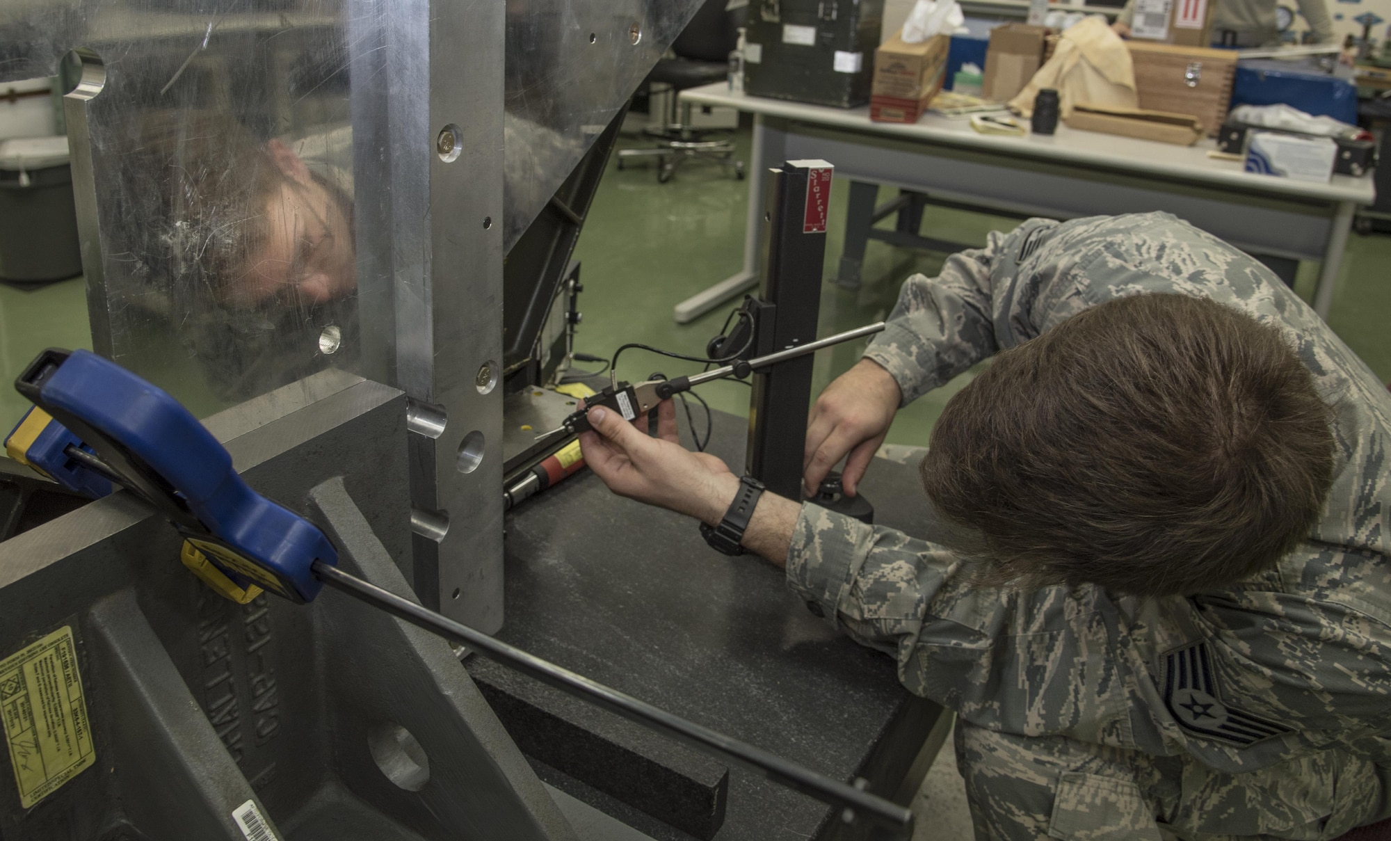 U.S. Air Force Staff Sgt. Jeffery Tyler, a 35th Maintenance Group physical dimension NCO in charge, uses an electronic height gage on a boresight fixture at Misawa Air Base, Japan, Nov. 2, 2016. The electronic height gage is used to measure how parallel an object is to a flat surface. (U.S. Air Force photo by Airman 1st Class Sadie Colbert)