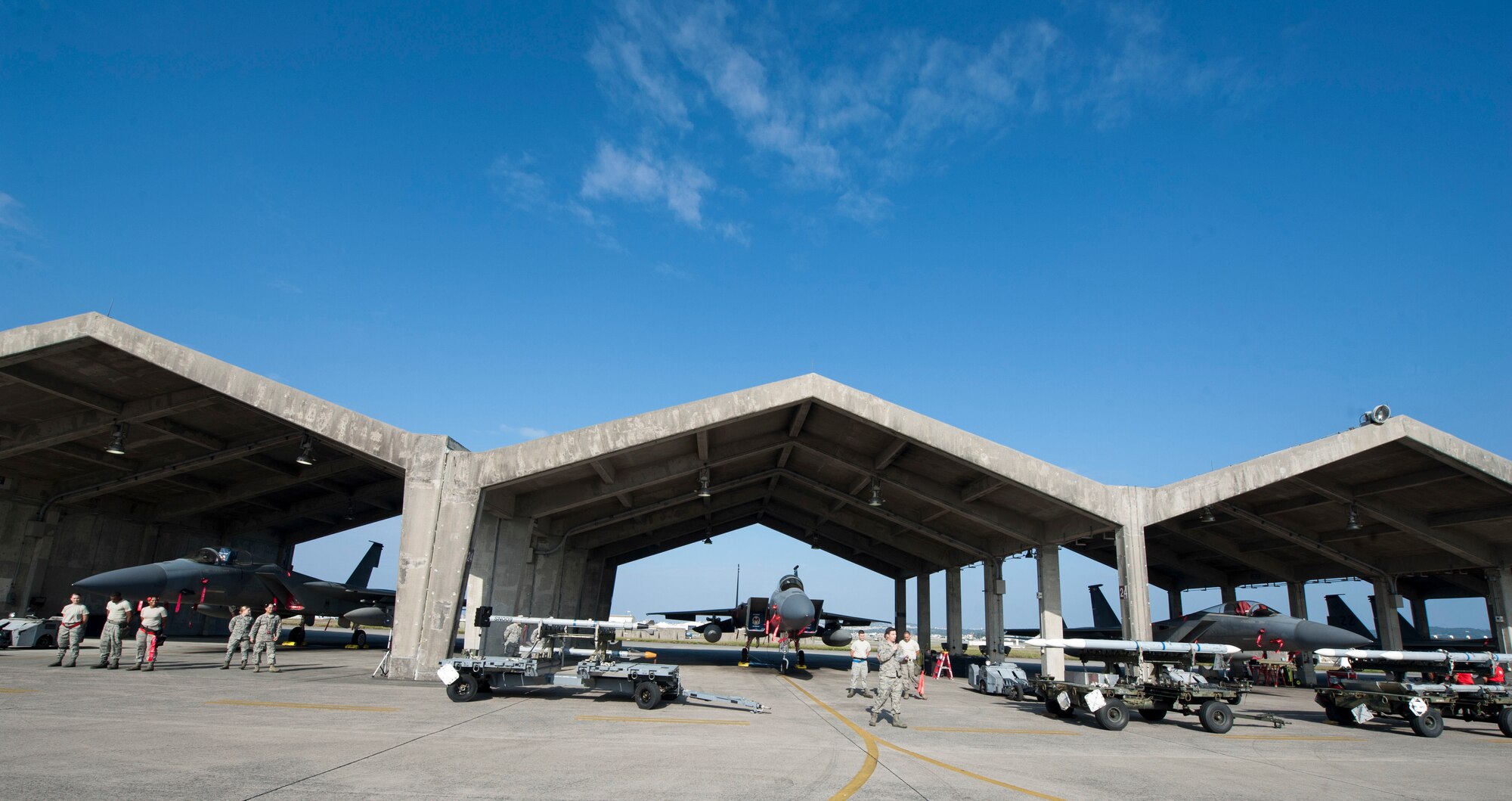 U.S. Air Force Airmen from the 18th Aircraft Maintenance Squadron prepare for the annual weapons load competition Jan. 4, 2017, at Kadena Air Base, Japan. The competition is held between the 67th and 44th Aircraft Maintenance Units to find out which Airmen make up the fastest weapons load crews on Kadena. (U.S. Air Force photo by Senior Airman Lynette M. Rolen/Released)