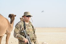 Senior Airman Rhea Flambeau, left, and Senior Airman Grayson Bryant, right, 386th Expeditionary Security Forces Squadron patrolmen, check out weapons in the armory at an undisclosed location in Southwest Asia Jan. 1, 2017. Bryant, a member of the wing’s base security zone patrol, is responsible for patrolling the outside of the base to guard against threats posed to the wing mission and interact with citizens who live in the surrounding camps. (U.S. Air Force photo/Tech. Sgt. Kenneth McCann)
