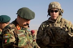 Lt. Gen. Muhammad Waziri, left, 201st Afghan National Army Corps commander, and Train Advise Assist Command-East Command Sgt. Maj. Bryan Barker discuss collective training during an expeditionary advisory package mission in Sarobi district, Afghanistan, Dec. 27, 2016. (U.S. Army photo by Capt. Grace Geiger)