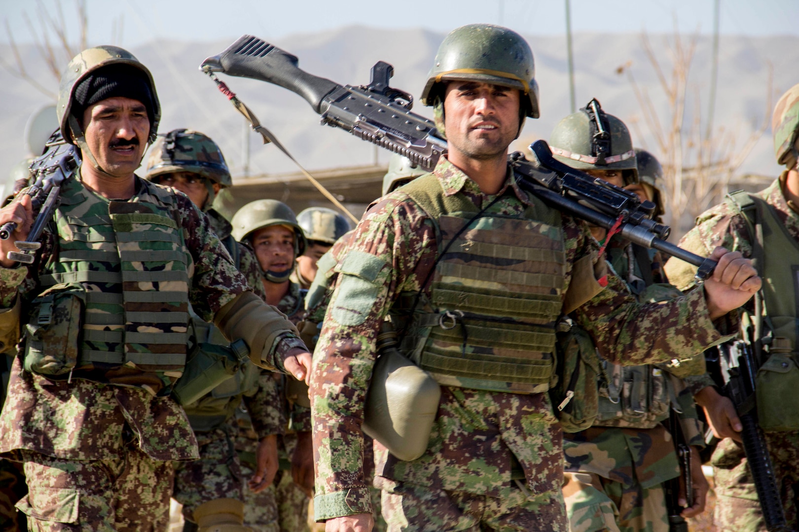 Soldiers assigned to the 201st  Afghan National Army Corps return from conducting collective training near Camp Torah in Sarobi district, Afghanistan, Dec. 27, 2016.  The training was conducted as part of the corps winter campaign strategy designed to build capability and capacity within the organization. (U.S. Army photo by Capt. Grace Geiger)