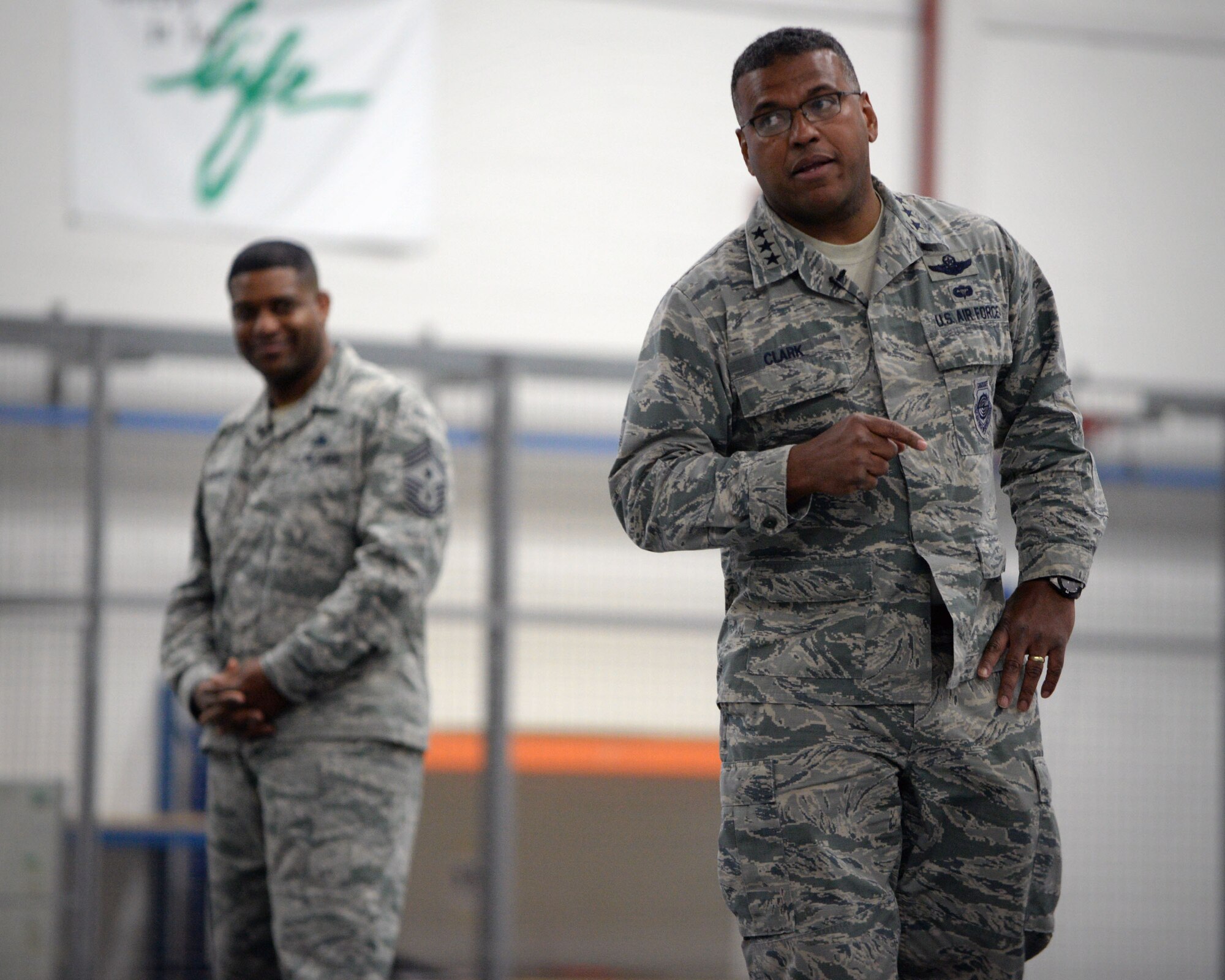 U.S. Air Force Lt. Gen. Richard Clark, 3rd Air Force commander, speaks with Team Mildenhall members during a base all call, Jan. 5, 2016, on RAF Mildenhall, England. Clark explained his appreciation for Team Mildenhall Airmen, emphasized taking care of Airmen and their families, and encouraged everyone to achieve their everyday goals. (U.S. Air Force photo by Senior Airman Christine Halan)