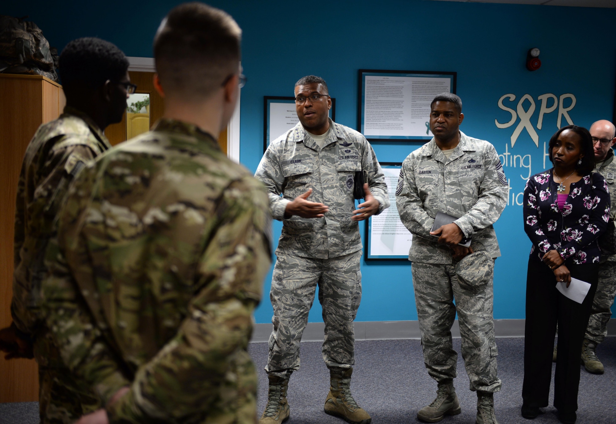 U.S. Air Force Lt. Gen. Richard Clark, center, 3rd Air Force commander, and U.S. Air Force Chief Master Sgt. Phillip Easton, 3rd Air Force command chief, thank Team Mildenhall Airmen for their involvement with the Sexual Assault Prevention Response team Jan. 5, 2016, on RAF Mildenhall, England. Clark and Easton visited units around base to get a better understanding of Team Mildenhall contribution to the fight. (U.S. Air Force photo by Senior Airman Christine Halan)